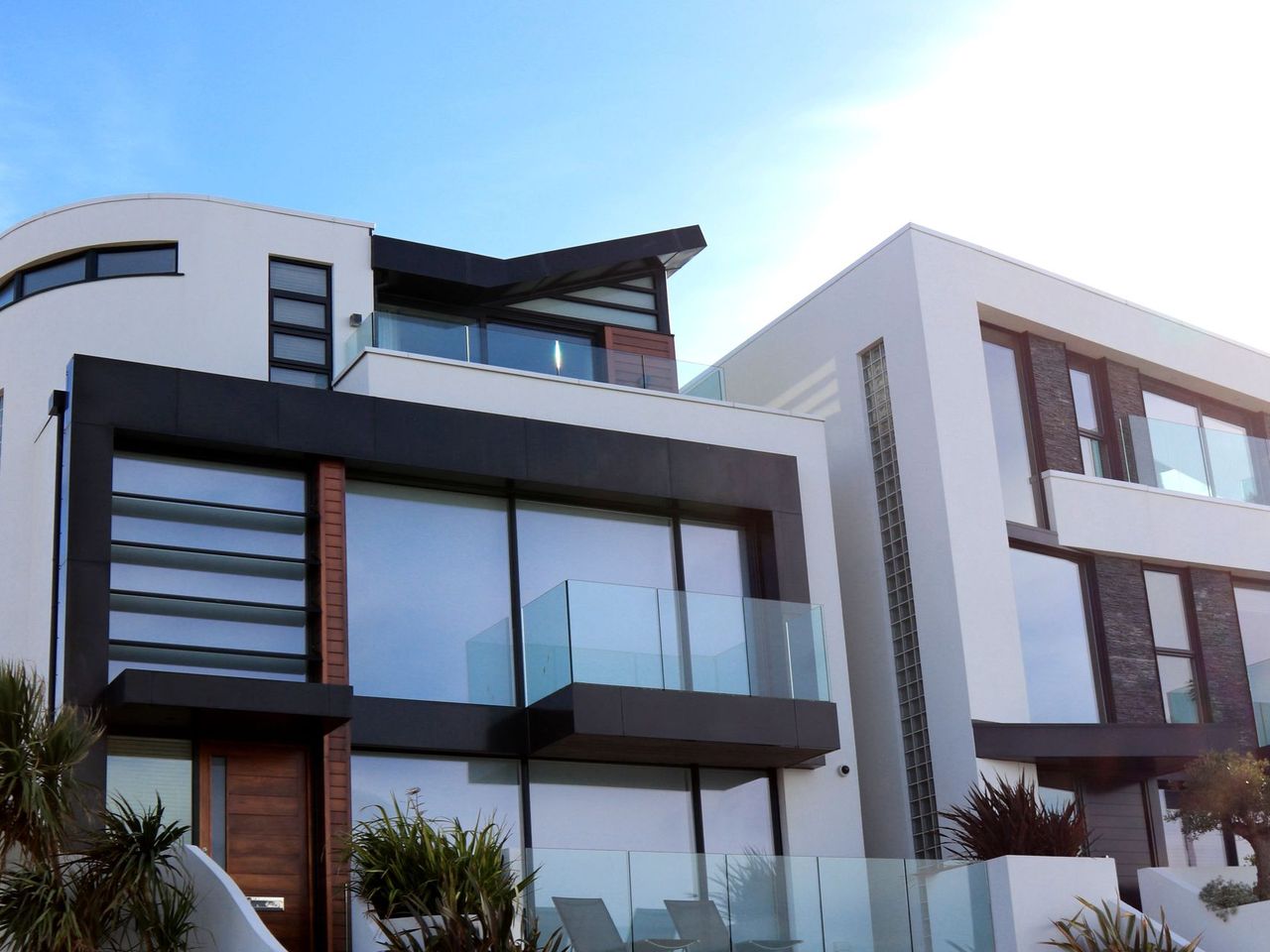 Sculptural glass-and-stone residence